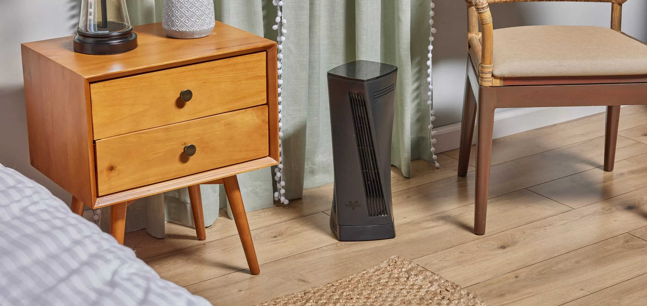 Vornado Up to 1500-Watt Fan Tower Indoor Electric Space Heater with Thermostat