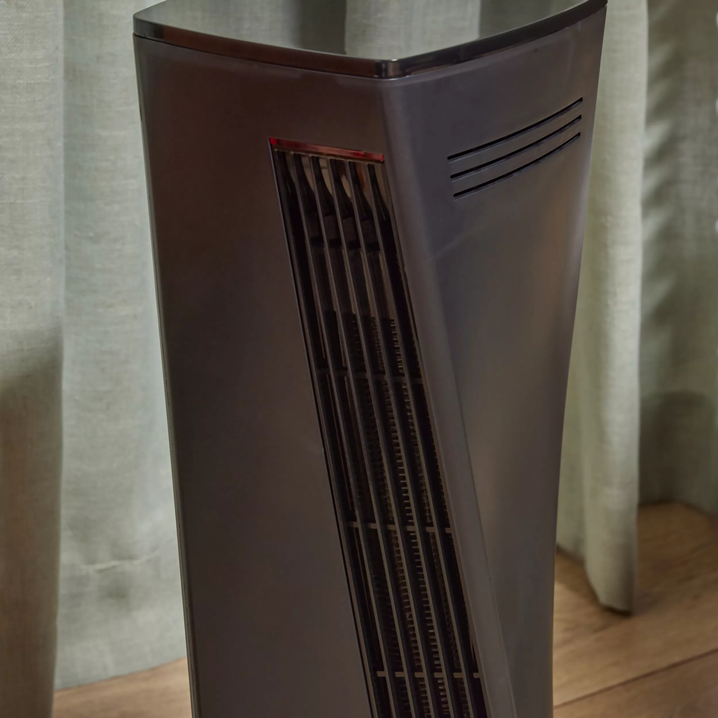 Vornado Up to 1500-Watt Fan Tower Indoor Electric Space Heater with Thermostat