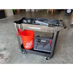 Husky 410-113-0111 2-Tier Plastic 4-Wheeled Service Cart in Black with 500 lb. Capacity