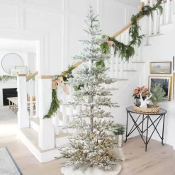 Glitzhome 2014600095 9 ft. Deluxe Pre-Lit Flocked Pine Artificial Christmas Tree with 650 Warm White Lights