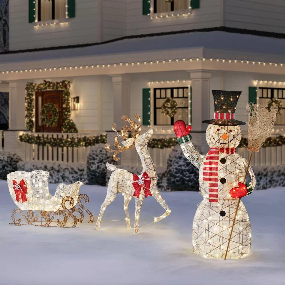 Home Accents Holiday 23RT01223112 6 ft. Warm White LED Snowman with Broom Stick Holiday Yard Decoration