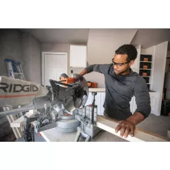 RIDGID 15 Amp 12 in. Corded Dual Bevel Sliding Miter Saw with 70 Deg. Miter Capacity with Professional Compact Miter Saw Stand