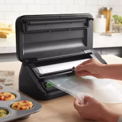 FoodSaver Select Vacuum Sealer with Dry/Moist Modes, Roll Storage and Cutter Bar, and Bags and Roll Starter Kit - Silver