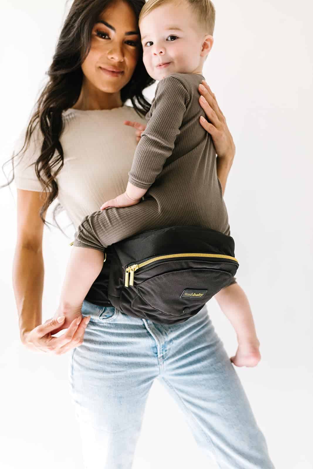 Tushbaby - Safety-Certified Hip Seat Baby Carrier - Mom’s Choice Award Winner, Seen on Shark Tank (Carrier, Black/Gold)
