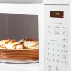 GE 1.6-cu ft 1000-Watt 29.88-in Over-the-Range Microwave (White)