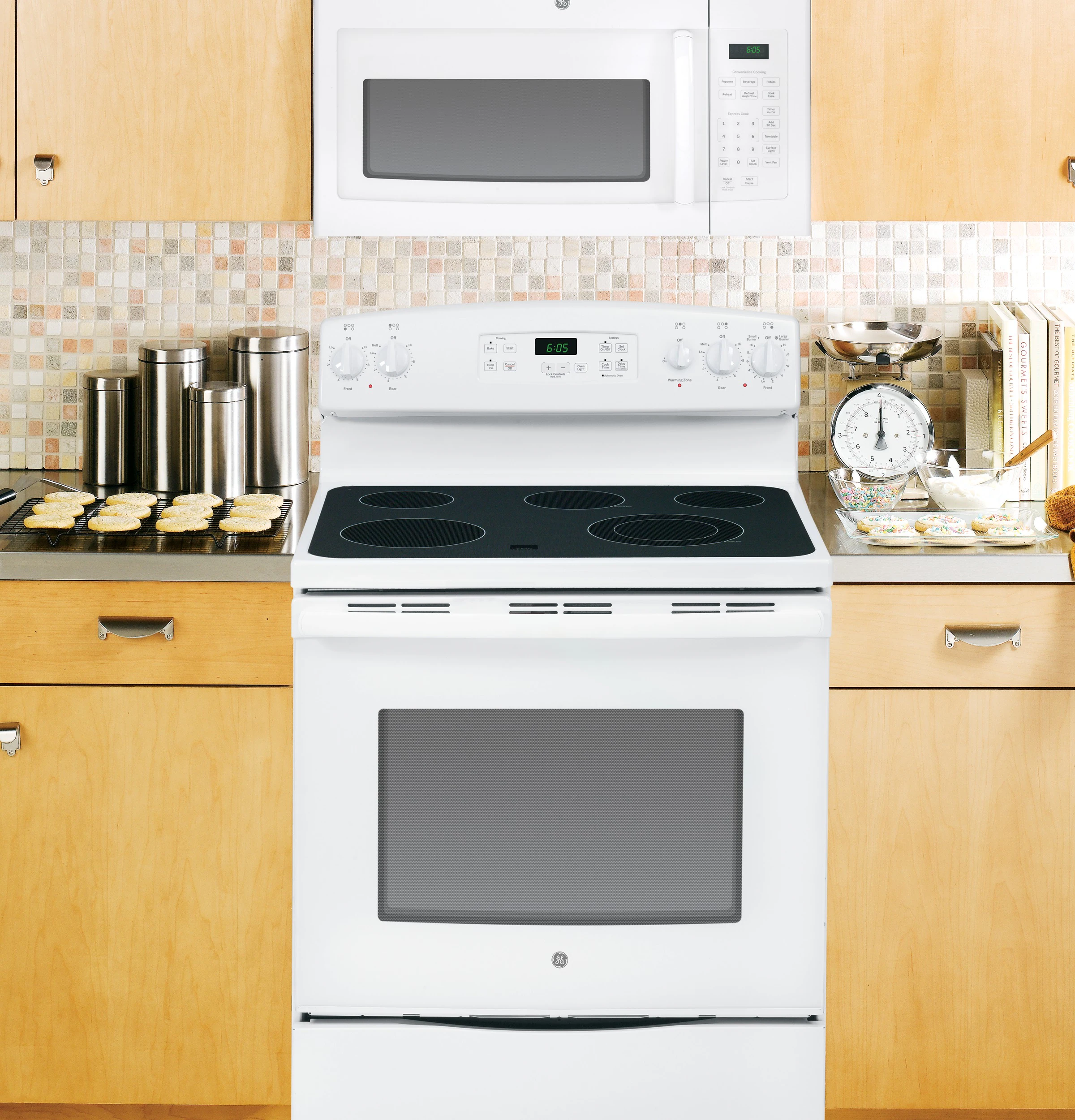 GE 1.6-cu ft 1000-Watt 29.88-in Over-the-Range Microwave (White)