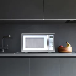 Farberware Classic Countertop Microwave Oven, 1.1 Cubic Feet cu. ft., 1000 watts, with Child Lock - White Platinum