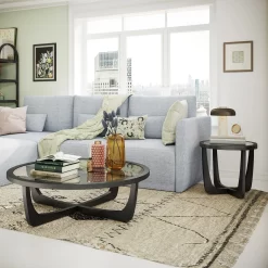 Beautiful by Drew Barrymore Round Rattan and Glass Top Coffee Table, Black