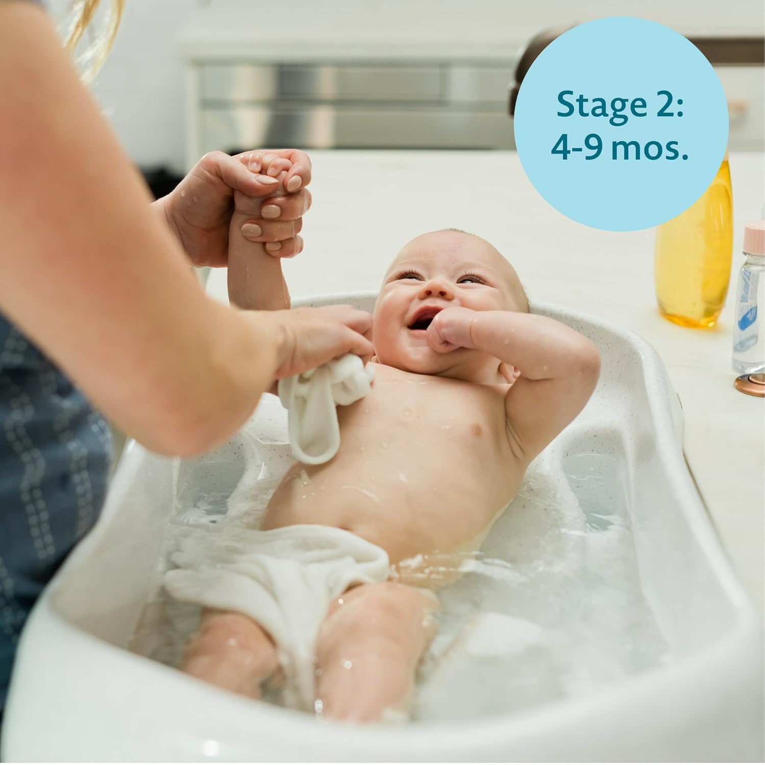 The First Years Rain Shower Baby Bath Tub Set - Includes Convertible Bath Tub and Sling with Soothing Spray
