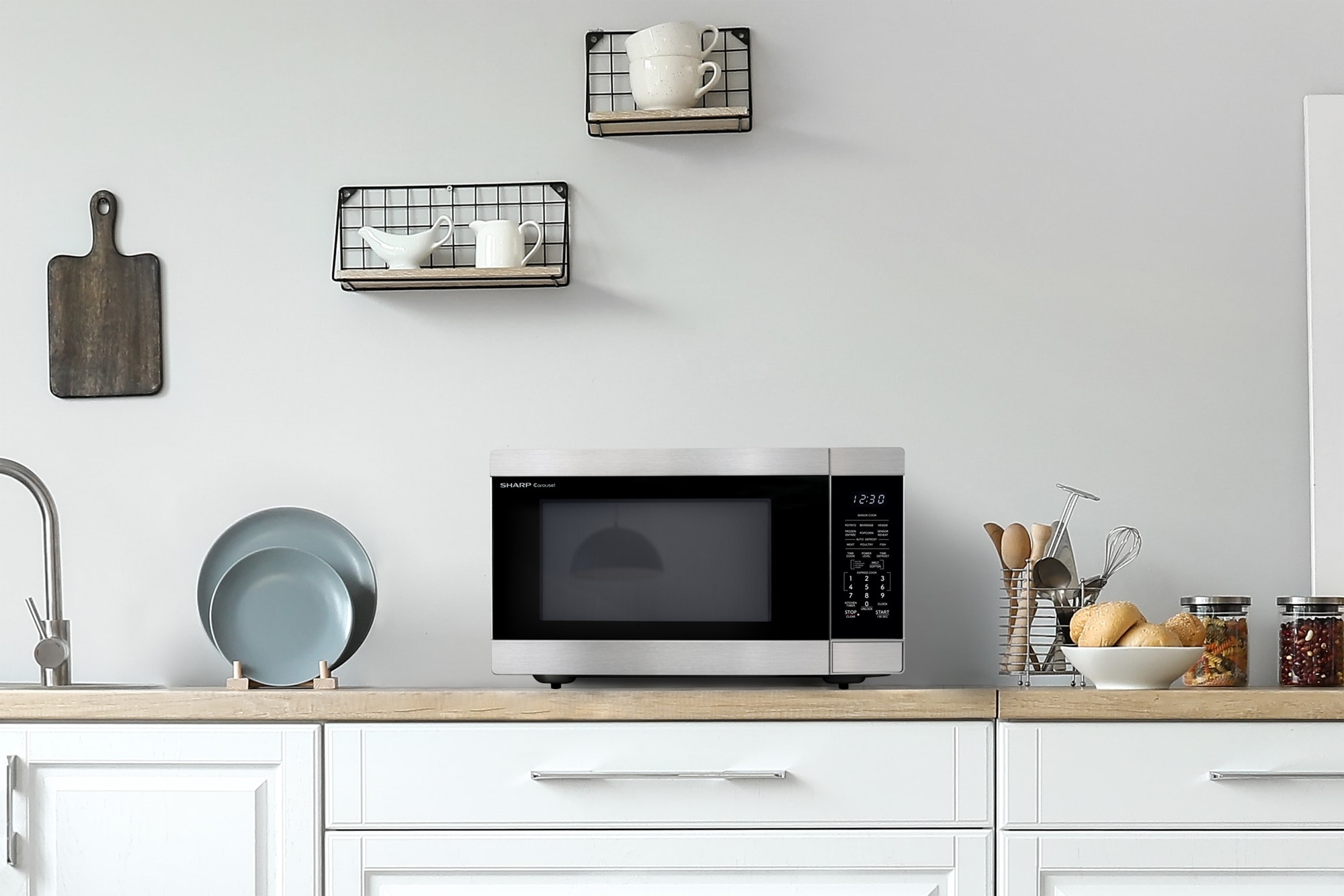 Sharp 2.2-cu ft Large (Greater than 1.5-cu ft) 1200 -Watt Sensor Cooking Controls Countertop Microwave ( Stainless Steel )