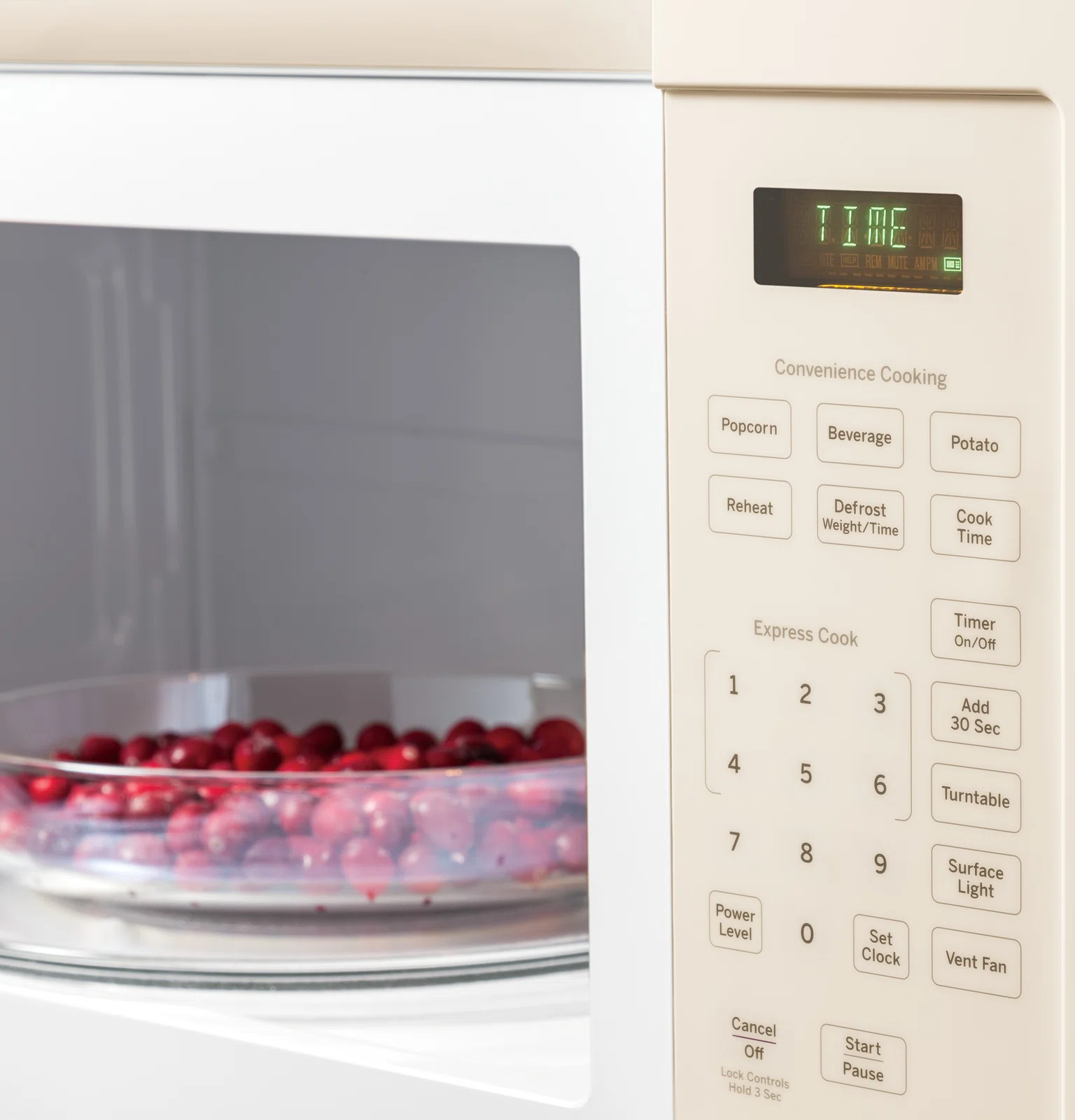 GE Appliances 30" 1.6 cu.ft. Over-The-Range Microwave, Bisque