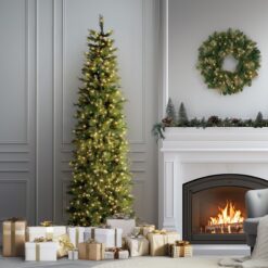 National Tree Company 9-ft Carolina pine Pre-lit Slim Flocked Artificial Christmas Tree with White Incandescent Lights
