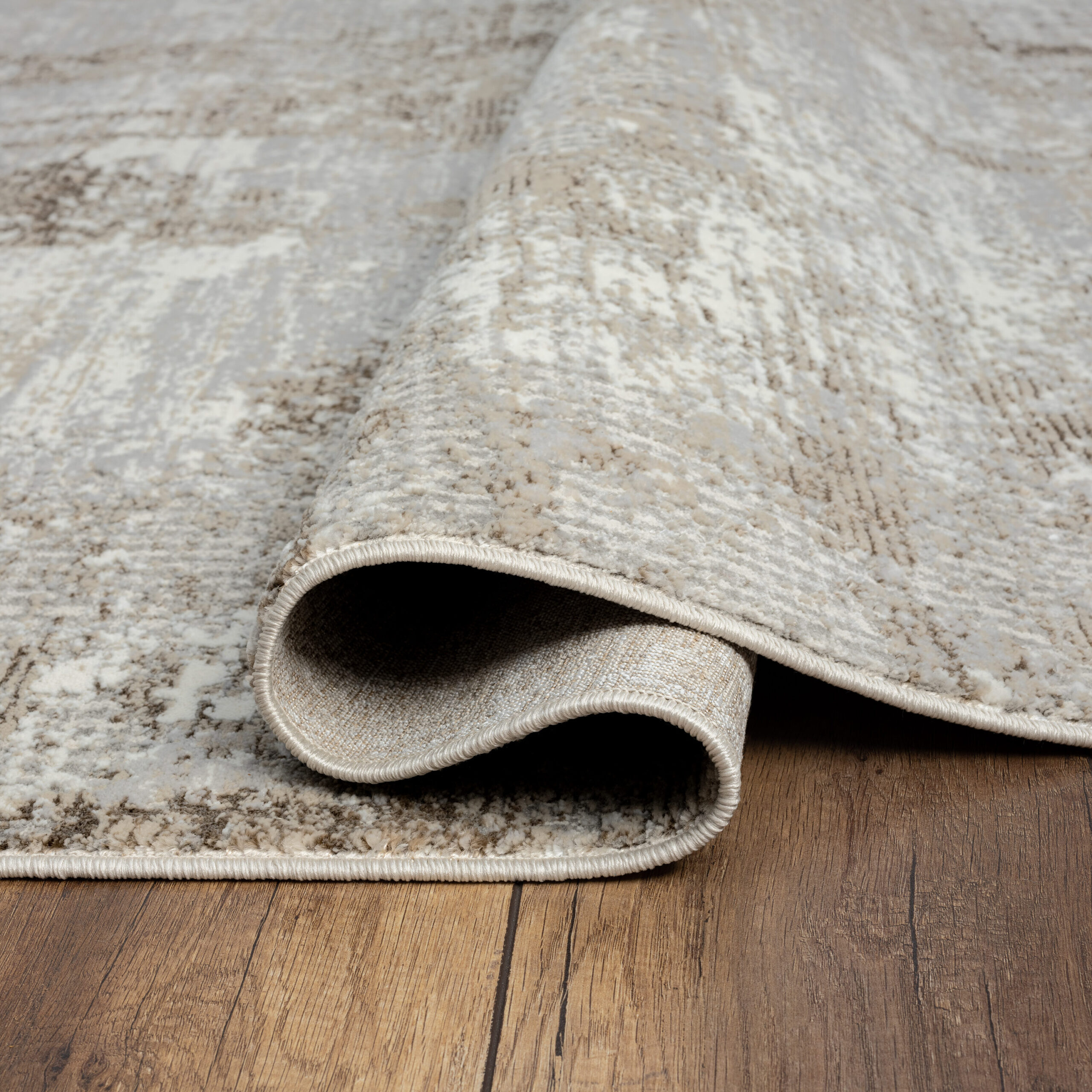 Origin 21 Beige Shimmer 9 x 12 (ft) Loomed Polyester Beige Rectangular Indoor Abstract Spot Clean Only Pet Friendly Area rug