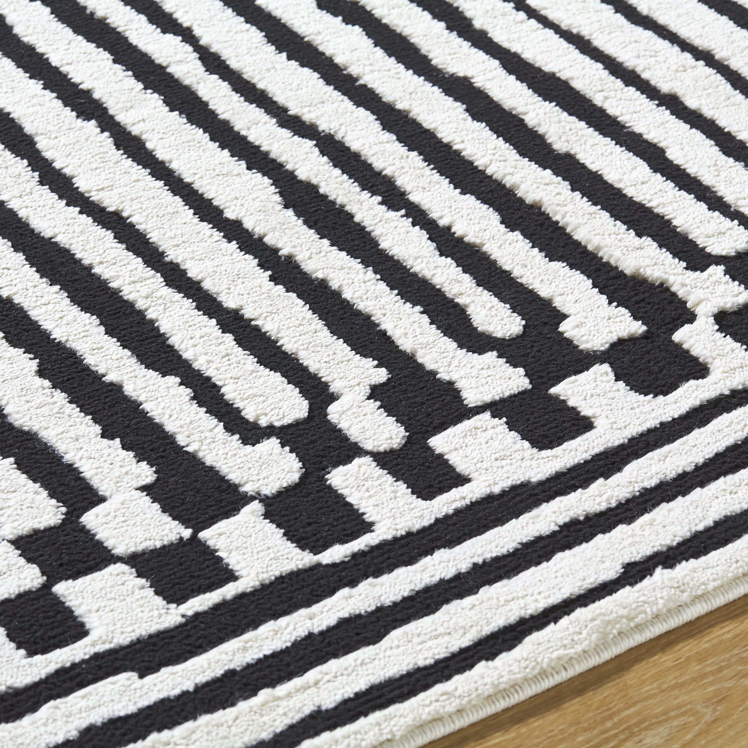 Origin 21 Obsidian Mirage 9 x 12 (ft) Loomed Polyester/Polypropylene Onyx/White Rectangular Indoor Stripe Moroccan Spot Clean Only Pet Friendly Area rug
