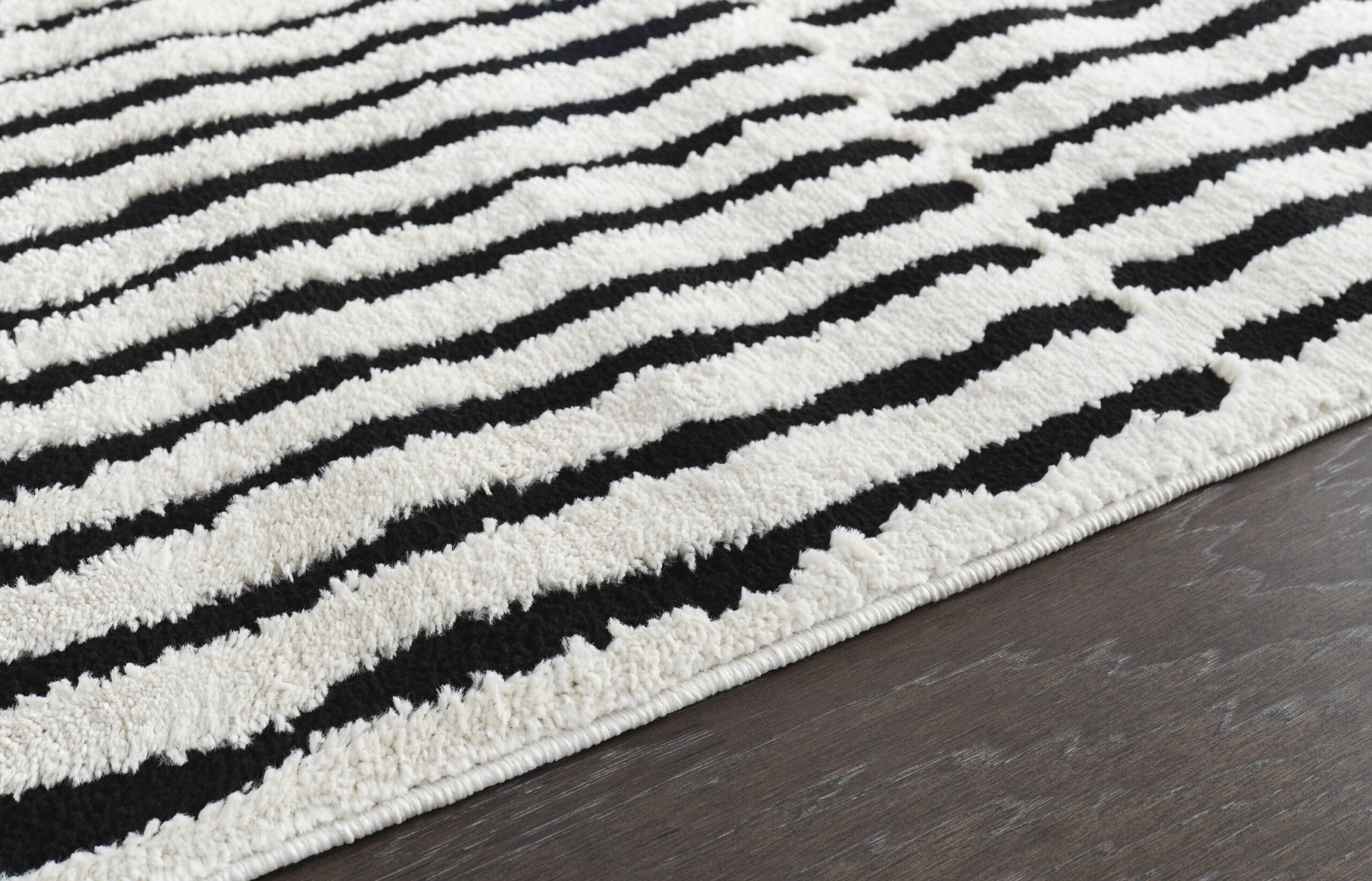 Origin 21 Obsidian Mirage 9 x 12 (ft) Loomed Polyester/Polypropylene Onyx/White Rectangular Indoor Stripe Moroccan Spot Clean Only Pet Friendly Area rug