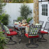 Nuu Garden 7 -Piece Black Patio Dining Set Iron Rectangle Table with 6 Red Cushions Swivel Chairs