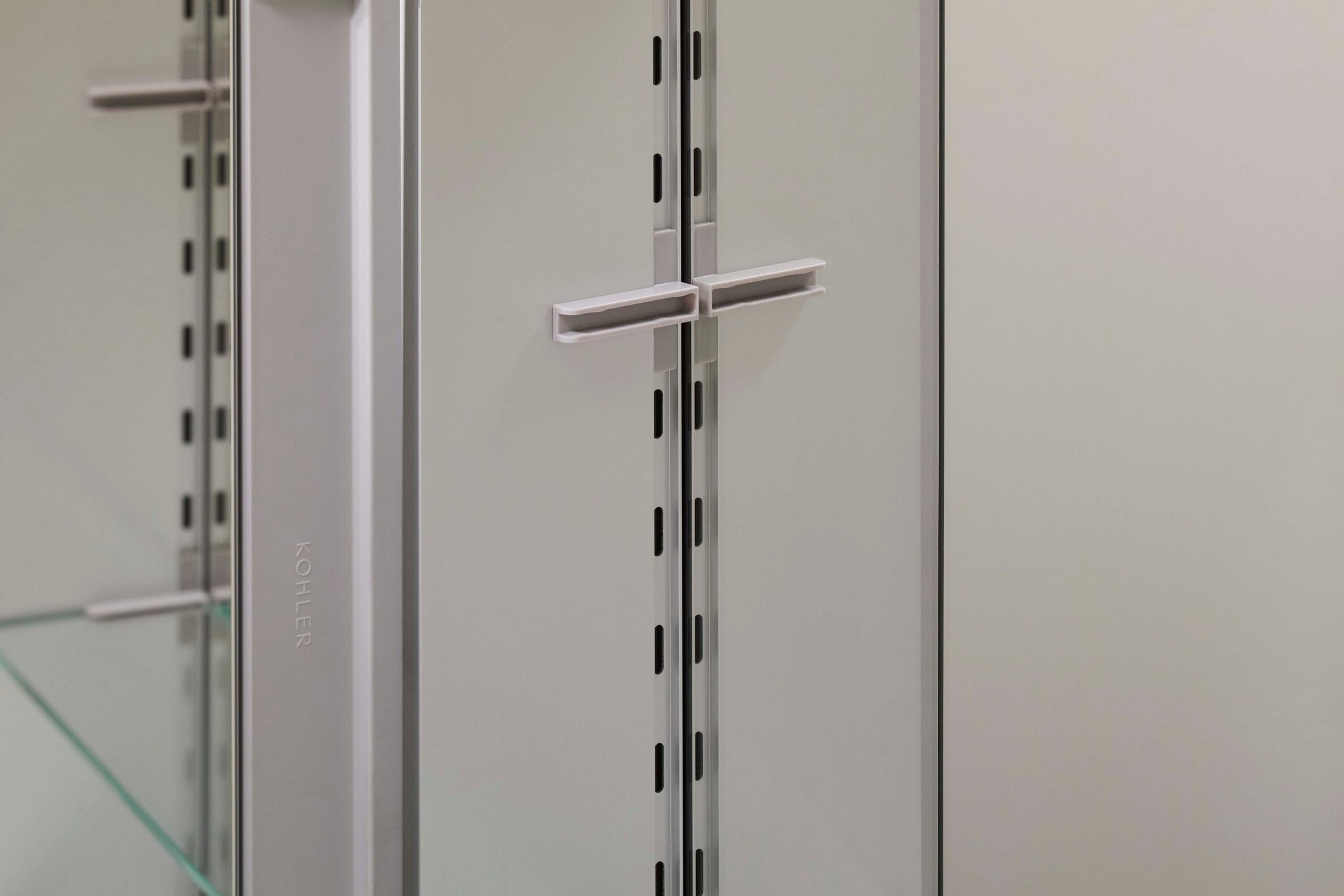 KOHLER Embark 35-in x 26-in Surface/Recessed Mount Anodized Aluminum Mirrored Rectangle Soft Close Medicine Cabinet